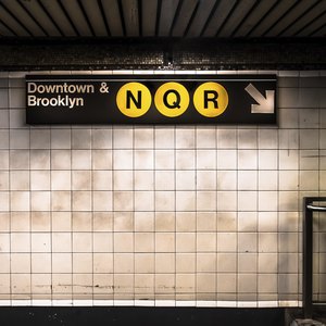 Train sign inside of subway station