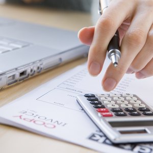 woman calculating savings amount