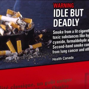 Graphic health warning label attached to cigarette boxes and packs in Canada