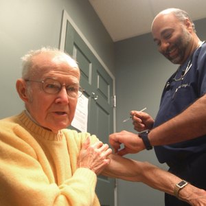 Man receives flu shot from Ft. Erie, Ontario