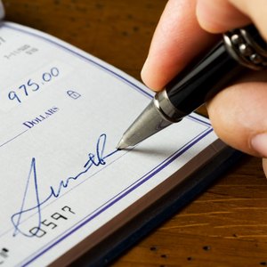 What to Do If Someone Writes a Check Against a Closed Bank Account