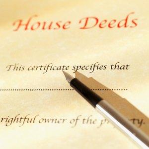 How to Convey 1/2 Interest in a Property Deed