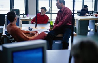 Ryan McVay/Digital Vision/Getty Images MS Groove allows multiple employees to work on a single project.