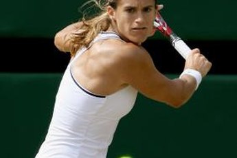 A good shoulder turn is key to hitting an effective backhand.