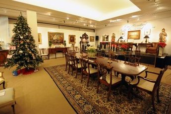Real estate auctions occasionally include the sale of the owner's personal possessions.