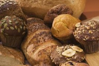 Whole-grain foods like brown bread can cause bloating.