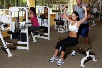 Shoulder presses tone and strengthen the delts and traps.