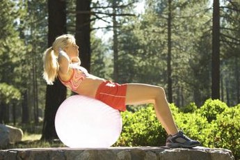 Crunches on a stability ball can help tighten your tummy.