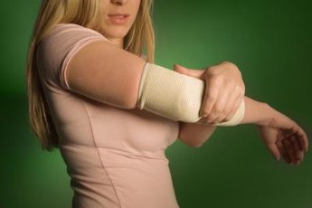 Treat and prevent tennis elbow with stretching and strengthening exercises.