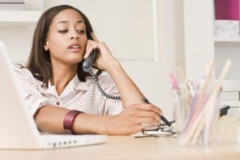 Answer your work phone with a pleasant, professional greeting.