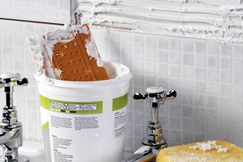 Adding tile can update your bathroom on a budget.