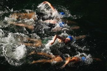 Triathletes often use crossover kicking to keep their legs fresh for the biking and running legs of the race.