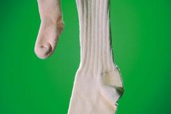 Use baby socks to create dog paw socks.
