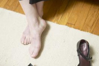 Ditch your heels for flats to make your feet feel better.