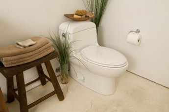 Strict environmental laws require toilets to flush using less than two gallons of water.