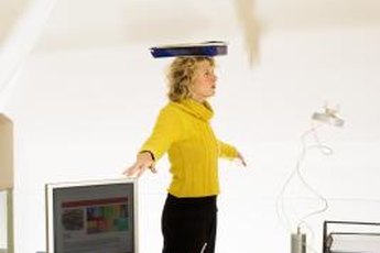 Balancing a book on your head may not be enough to counter years of slouching.