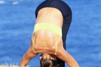 Practice Hatha yoga poses to loosen your neck and shoulder muscles.