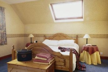 Cool your bedroom efficiently with inexpensive strategies.