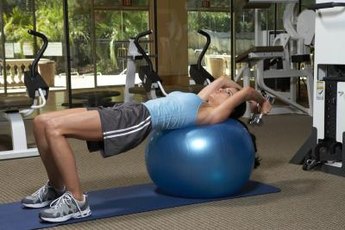Dumbell pullovers can be performed on a bench or an exercise ball.
