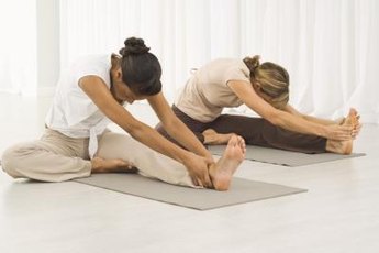 Bikram yoga provides practitioners with a challenging workout.