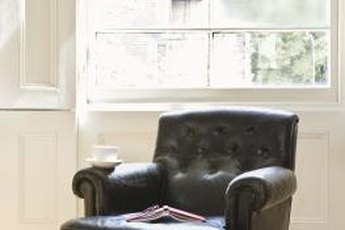 Your leather chair is less likely to smell like your animals if you train your pets to stay off it.