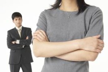 Your body language may appear standoffish to your coworkers.