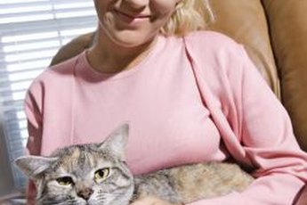 Cuddling with Kitty can reduce stress and keep your heart healthy.