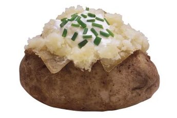 Chives may make this potato more appealing to you, but they can make your cat sick.