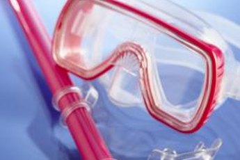 Snorkels attach to snorkeling masks to enable you to see and breathe with your face in the water.