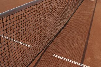 The rules of tennis dictate when to switch sides of the court.