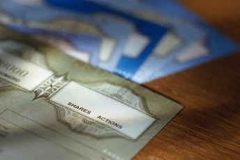 The IRS considers transfer of stock as a gift, which may be subject to tax.