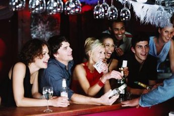 Know your employer's alcohol policy before sharing pictures of a night on-the-town.