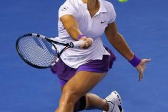 Strong calves help China's Li Na quickly move around the court.