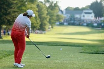 LPGA star Inbee Park rotates her torso through impact.
