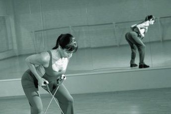 Resistance cords make toning the butt easy, even on the go.