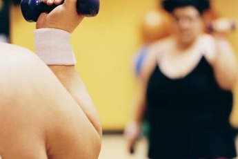 Dumbbells can tone the triceps area.