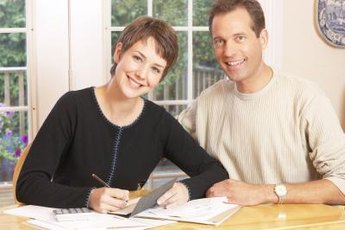 Create a budget together so both of you understand the household finances.