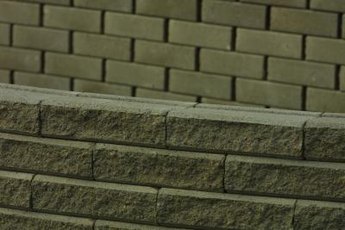 Brick masons use a variety of tools to build or repair walls.