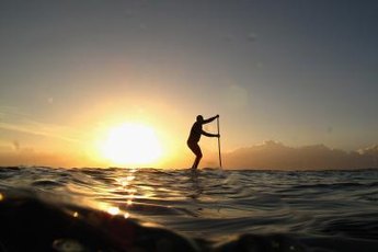 The paddling motion of SUP works your abs.