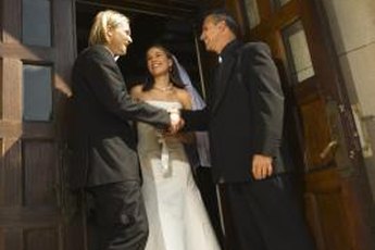 Discreetly give your priest cash, along with a thank-you note.