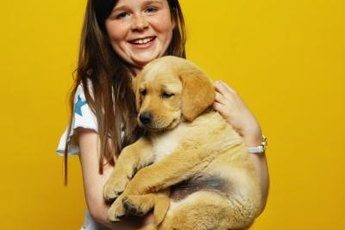 Puppies may continue to suckle long after they are weaned.