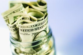Money jars can help you track and control spending.
