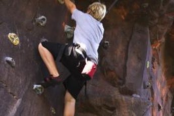 Rock climbing can help build and tone your legs and glutes.