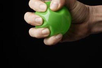 Pick a ball that fits in the palm of your hand so you can bend your fingers farther as you squeeze.