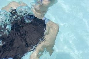 Suit up and strengthen your core in the water for a refreshing, effective workout.