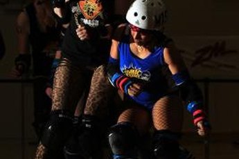 Blocking is a critical part of roller derby action.