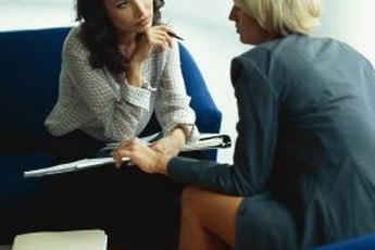 An HR specialist asks questions that are part of her investigative plan.