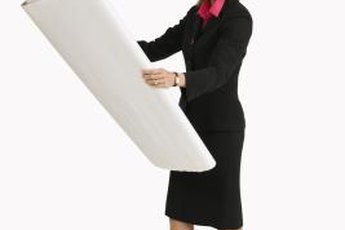 An architect spends much of her day in an office setting.