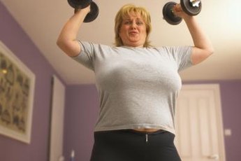 Use dumbbells to tighten and strengthen your chest.