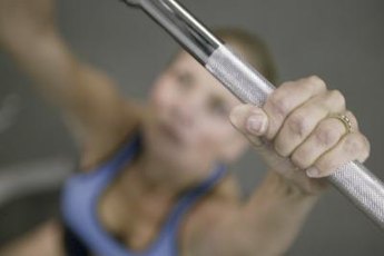 Lift a light weight the first time you perform the push press.